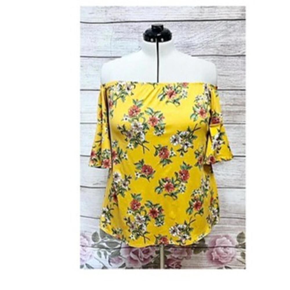 First Love yellow floral off the shoulder top. No size tag. Best for xl.